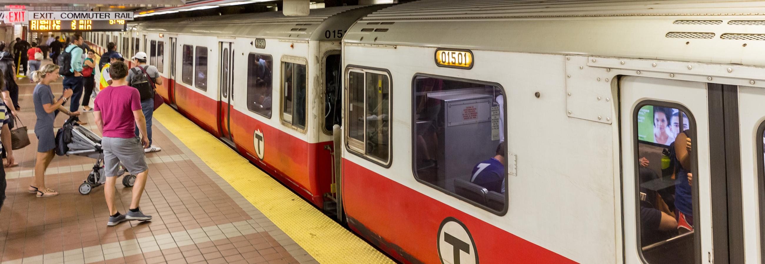 Customers wait to board Red Line