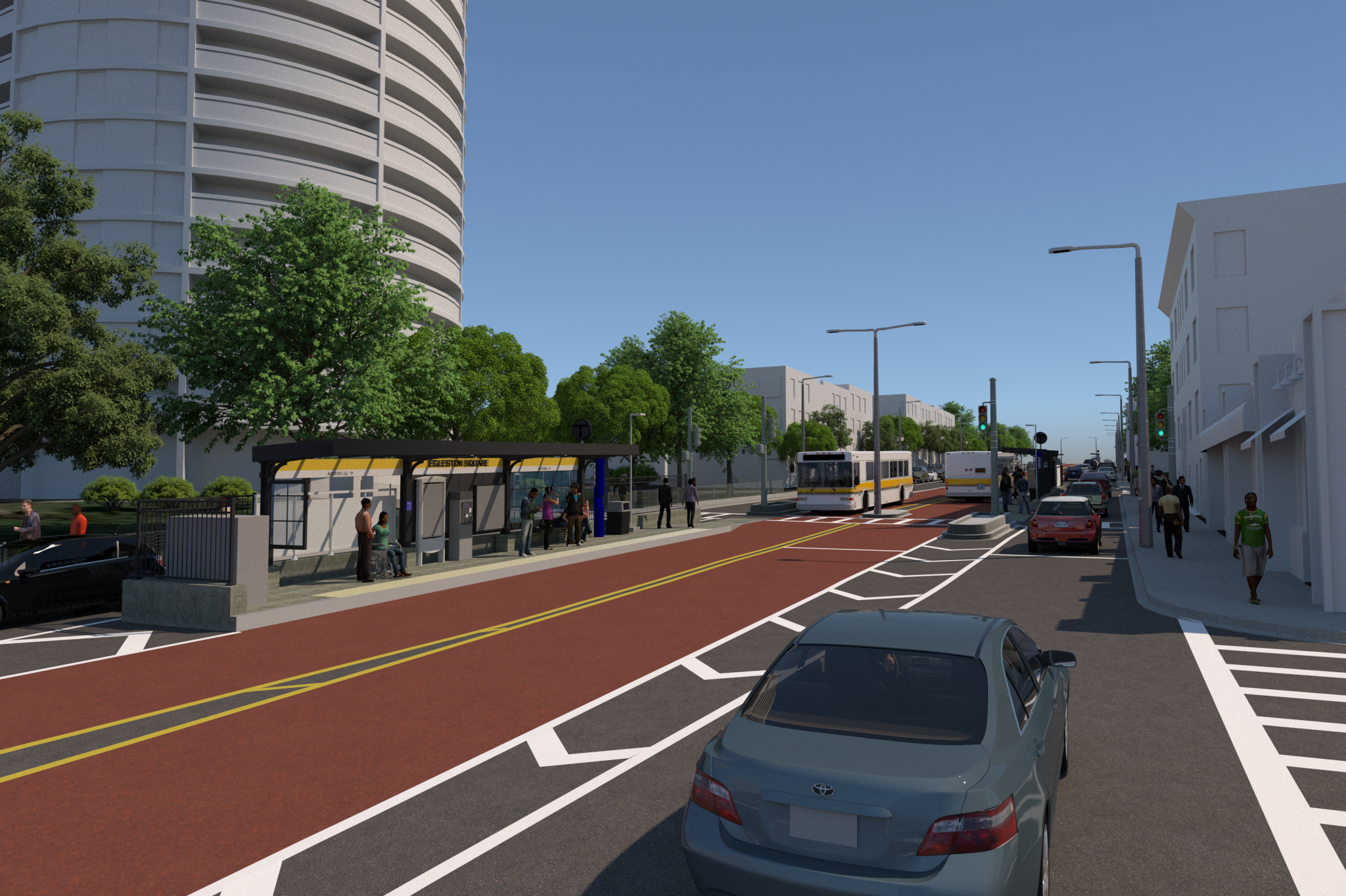 Ground level view of red bus lanes on Columbus Avenue in Boston. Clear day with cars parked along the street. 