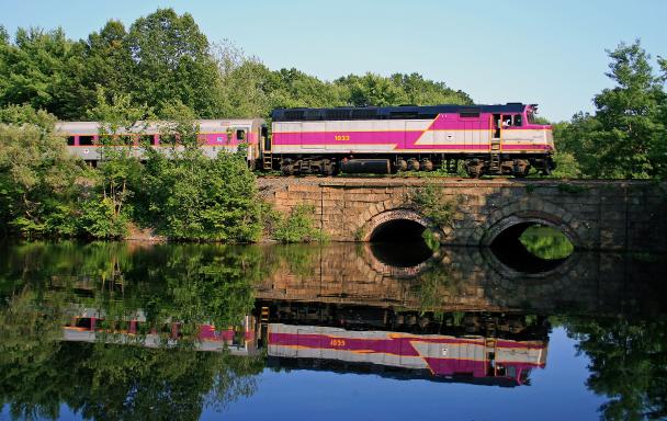 Commuter Rail train crossing a bridge in Ashland